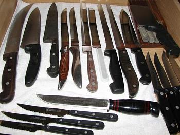 I'll bet that you don't collect "kitchen knives"....I DO! Check mine!-my-knife-drawer-.jpg