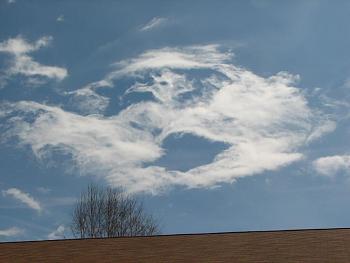 Who likes "cloud formations"......lets see yours!-laughing-face-clouds.jpg