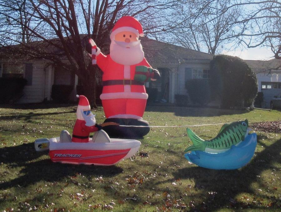 Cleves--inflatable Santa Claus and his fish